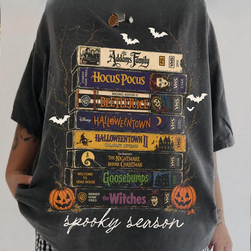 Halloween VHS Movie Stack Graphic Tee with Pumpkins, Bats, and Spooky Season Script