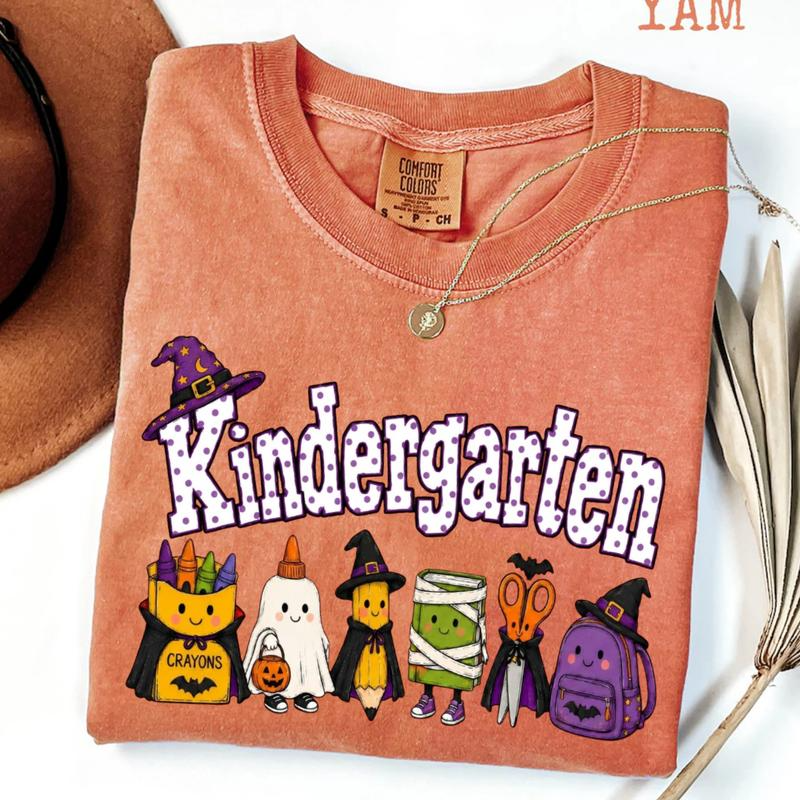 Kindergarten Halloween School Supplies Graphic Tee with Playful Witch Hats and Ghosts