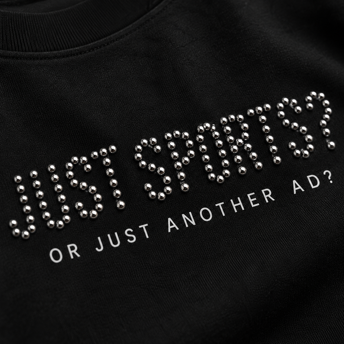 Just Sports? Studded Lettering Graphic T-Shirt with Or Just Another Ad? Message