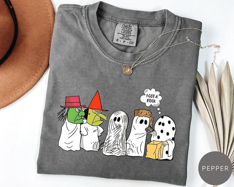 I Got a Rock Halloween Cartoon Ghost and Witch Graphic T-Shirt
