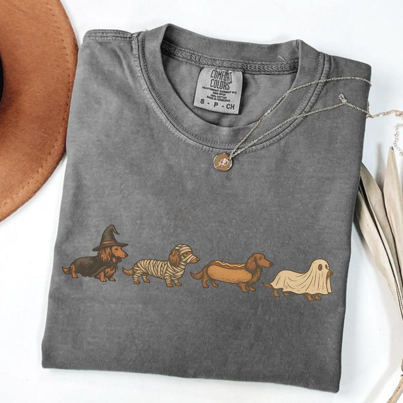 Halloween Dachshund Costume Parade Graphic T-Shirt with Vintage-Inspired Dog Artwork