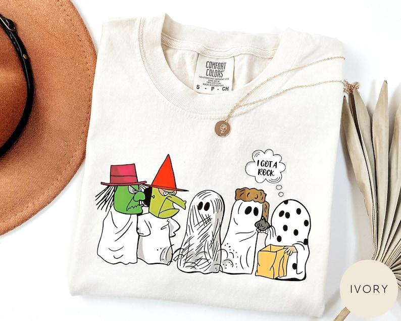 I Got a Rock Halloween Cartoon Ghost and Witch Graphic T-Shirt