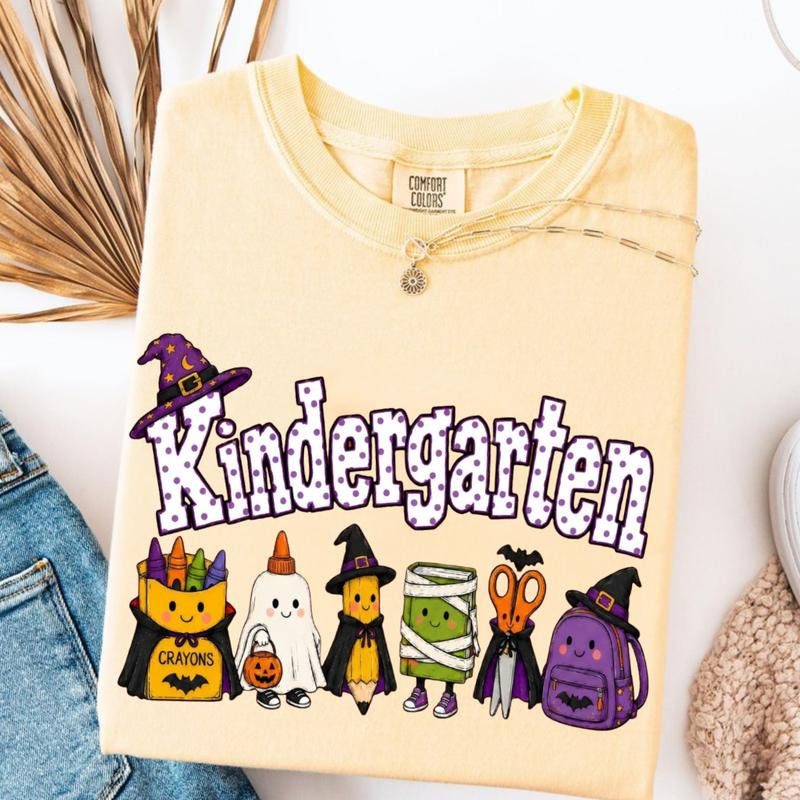 Kindergarten Halloween School Supplies Graphic Tee with Playful Witch Hats and Ghosts