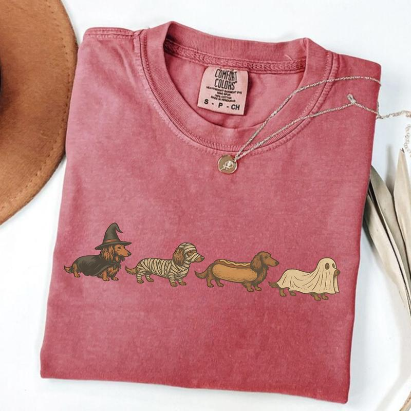 Halloween Dachshund Costume Parade Graphic T-Shirt with Vintage-Inspired Dog Artwork