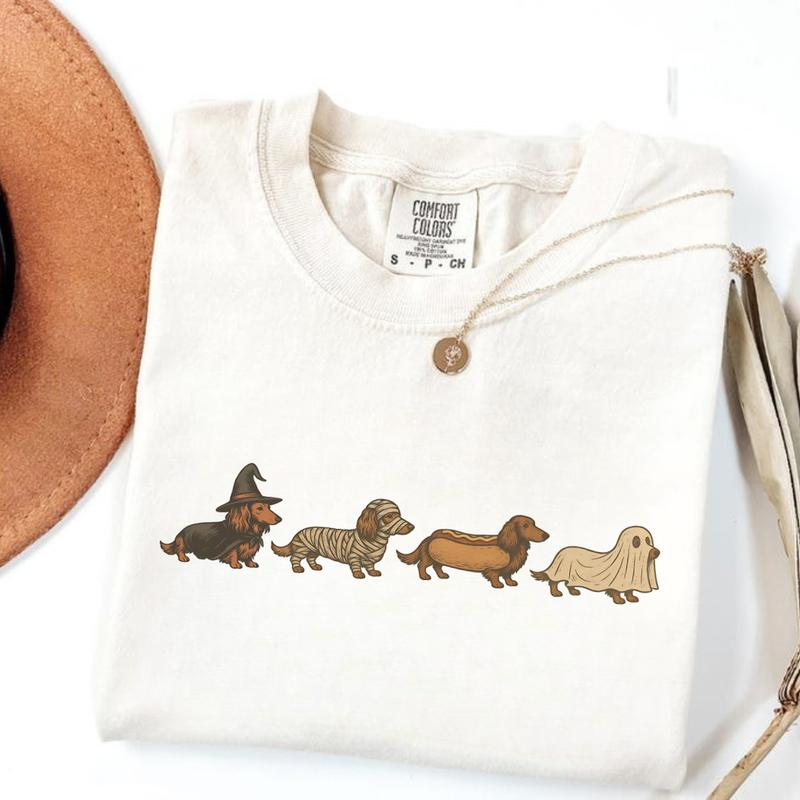 Halloween Dachshund Costume Parade Graphic T-Shirt with Vintage-Inspired Dog Artwork