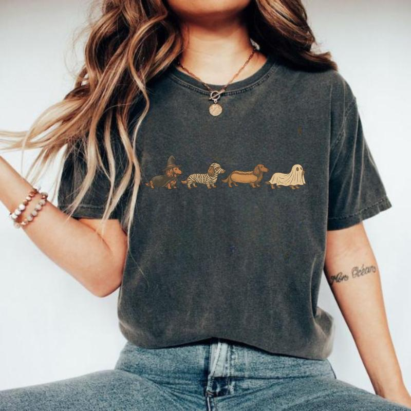 Halloween Dachshund Costume Parade Graphic T-Shirt with Vintage-Inspired Dog Artwork